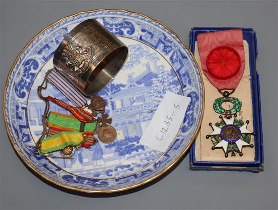 A French Officers Legion dHonneur enamel medal, six French miniature medals and other items